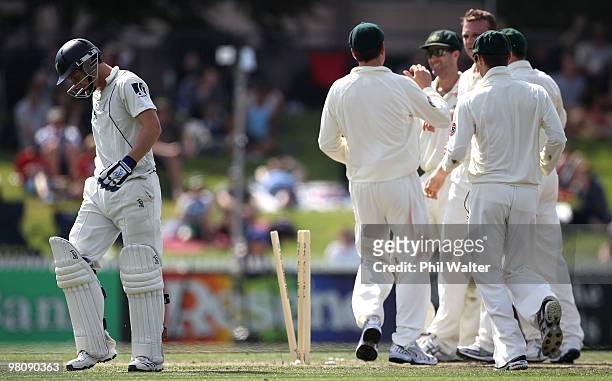 Watling of New Zealand walks off the field after being bowled by Doug Bollinger of Australia during day two of the Second Test Match between New...