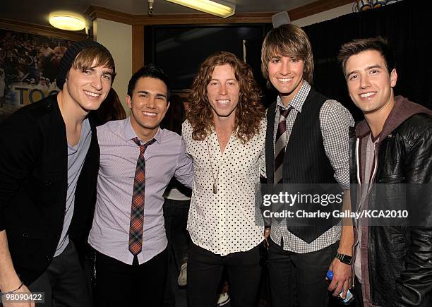 Musician James Maslow, musician Kendall Schmidt, Olympic snowboarder Shaun White, musician Carlos Pena Jr. And musician Logan Henderson backstage at...