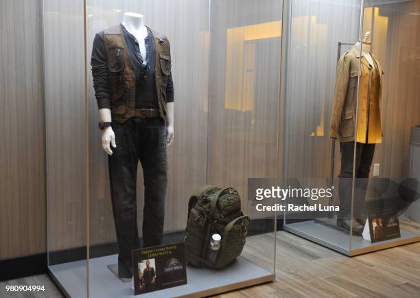 Original costumes worn by actors Chris Pratt and Bryce Dallas Howard in "Jurassic: World: Fallen Kingdom" are displayed inside Universal Cinema at...