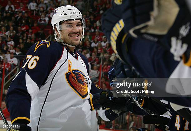 Evgeny Artyukhin of the Atlanta Thrashers celebrates his goal against the Carolina Hurricanes during their NHL game on March 27, 2010 at the RBC...