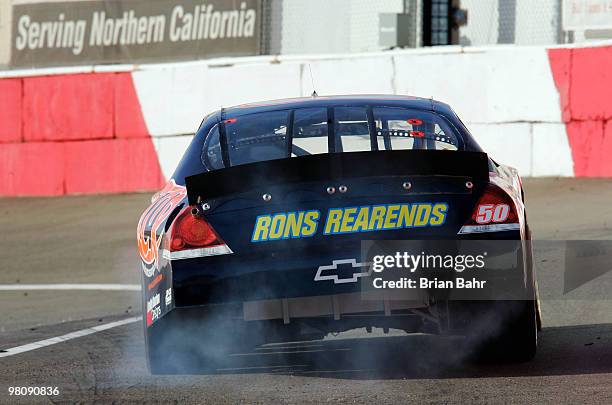 Auggie Vidocich burns some rubber as he starts onto the track during qualifying for the Toyota NAPA Bonus Challenge on March 27, 2010 in Roseville,...