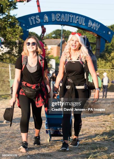 Ami Greenwell and Alison Kydd from London arrive on site at the Isle of Wight festival at Seaclose Park, Newport.