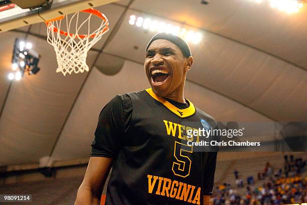 Kevin Jones of the West Virginia Mountaineers celebrates after West Virginia won 73-66 against the Kentucky Wildcats during the east regional final...