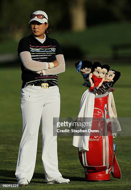 Jee Young Lee of South Korea stand by her bag with Betty Boop head covers during the third round of the Kia Classic Presented by J Golf at La Costa...