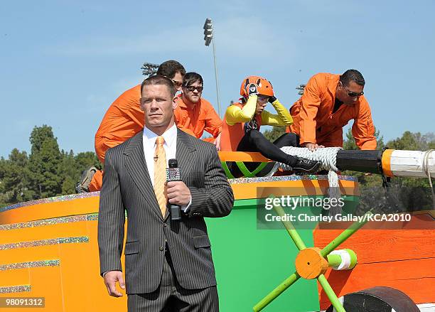 Speed skater Apolo Ohno and actor/wrestler John Cena onstage during a pre-filmed segment for Nickelodeon's 23rd Annual Kids' Choice Awards held at...