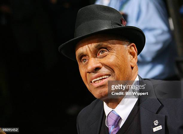 Former NHL player Willie O'Ree watches the action between the Buffalo Sabres and the Tampa Bay Lightning on March 27, 2010 at HSBC Arena in Buffalo,...