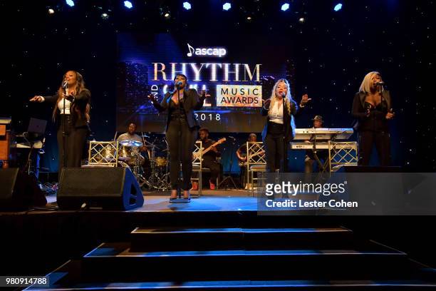 Kandi Burruss, LaTocha Scott, Tameka 'Tiny' Harris, Tamika Scott of Xscape perform onstage at the 31st Annual ASCAP Rhythm & Soul Music Awards at the...