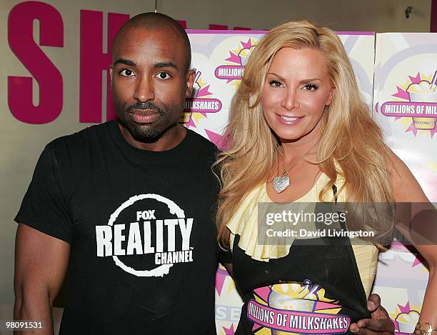 Personality Cindy Margolis poses with Tupac impersonator Josh Harraway at the launch of her milkshake at Millions of Milkshakes on March 27, 2010 in...