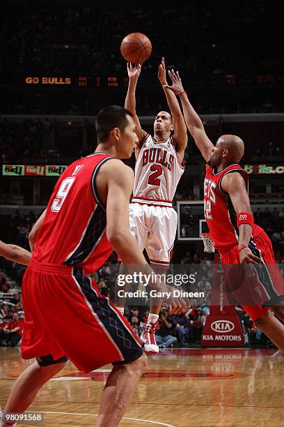 Jannero Pargo of the Chicago Bulls shoots a jumpshot against Jarvis Hayes of the New Jersey Nets on March 27, 2010 at the United Center in Chicago,...