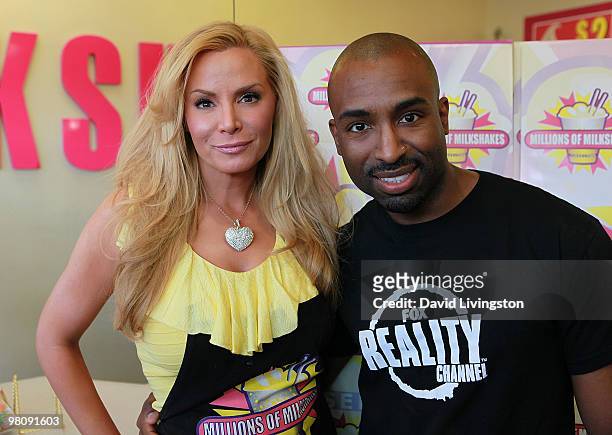 Personality Cindy Margolis poses with Tupac impersonator Josh Harraway at the launch of her milkshake at Millions of Milkshakes on March 27, 2010 in...