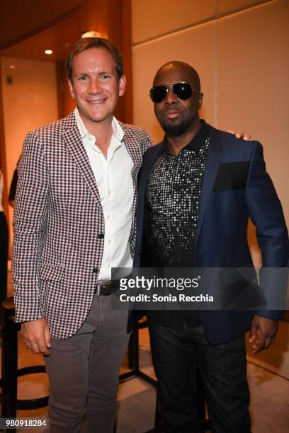 James Dodds and Wyclef Jean attend Joe Carter Classic After Party at Ritz Carlton on June 21, 2018 in Toronto, Canada.