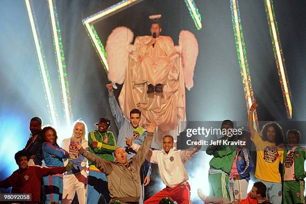 Host Kevin James and actor Adam Sandler perform onstage at Nickelodeon's 23rd Annual Kids' Choice Awards held at UCLA's Pauley Pavilion on March 27,...