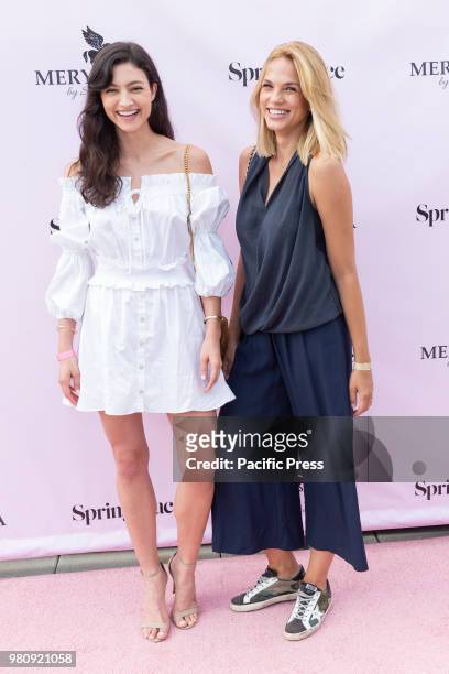 Isabelle Boemeke wearing dress by Caroline Constas attends Mery Playa by Sofia Resing swimsuit launch at Spring Place Rooftop.