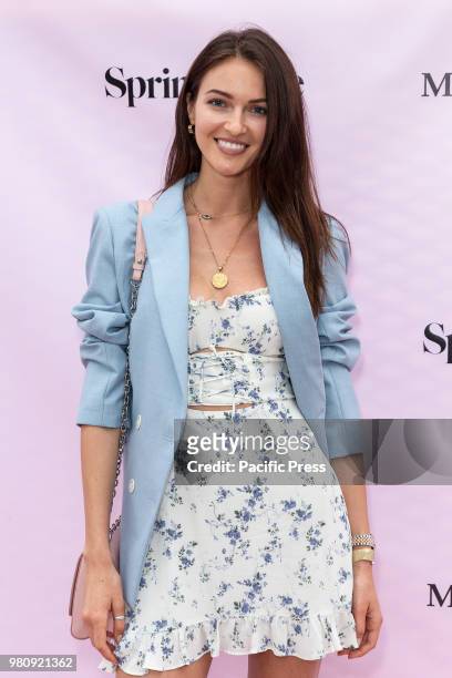 Katrina Kruglova wearing dress by Reformation attends Mery Playa by Sofia Resing swimsuit launch at Spring Place Rooftop.