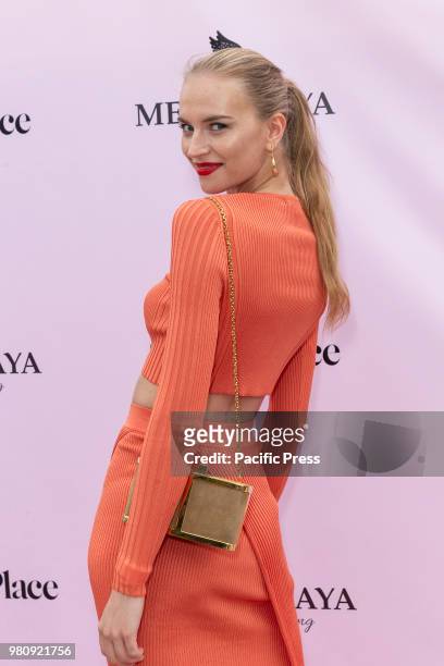 Anabela Belikava Belikova wearing dress by Ronny Kobo attends Mery Playa by Sofia Resing swimsuit launch at Spring Place Rooftop.