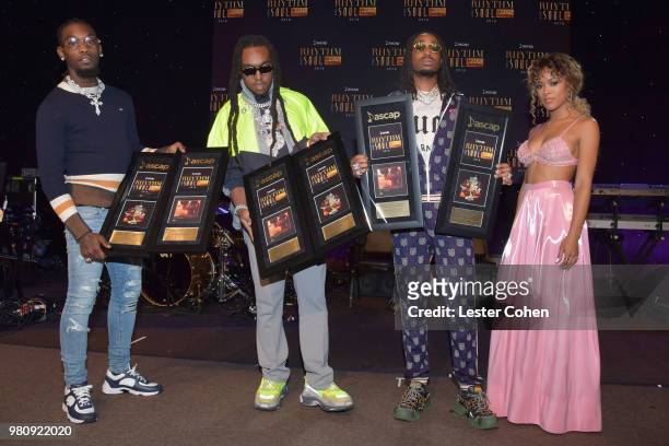 Offset, Takeoff and Quavo of Migos and Serayah pose with song awards at the 31st Annual ASCAP Rhythm & Soul Music Awards at the Beverly Wilshire Four...