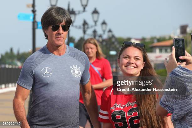 Joachim Loew, head coach of Germany pose for selfies prior his start for a morning run on Adler Beach Boulevard at the team Hotel Radisson Blu...