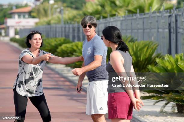 Joachim Loew, head coach of Germany pose for selfies prior his start for a morning run on Adler Beach Boulevard at the team Hotel Radisson Blu...