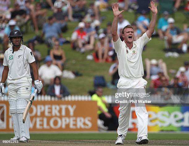 Doug Bollinger of Australia appeals for the wicket of Ross Taylor of New Zealand caught by Brad Haddin during day two of the Second Test Match...