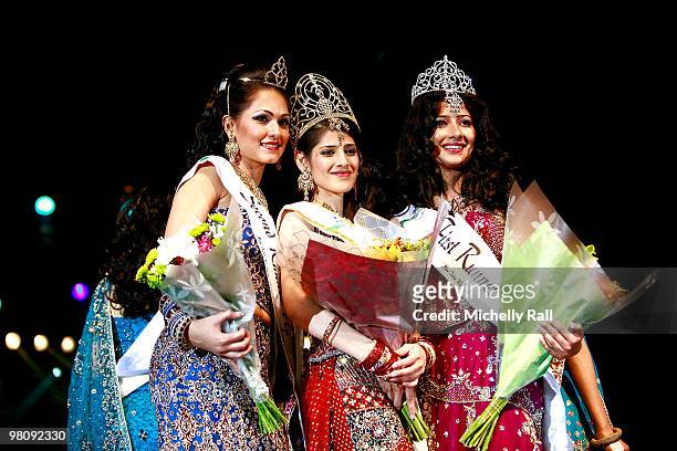 Miss South Africa Kajal Luthminarain is crowned Winner of the Miss India Worldwide 2010 flanked by Miss Suriname Cher Marchand second Princess and...