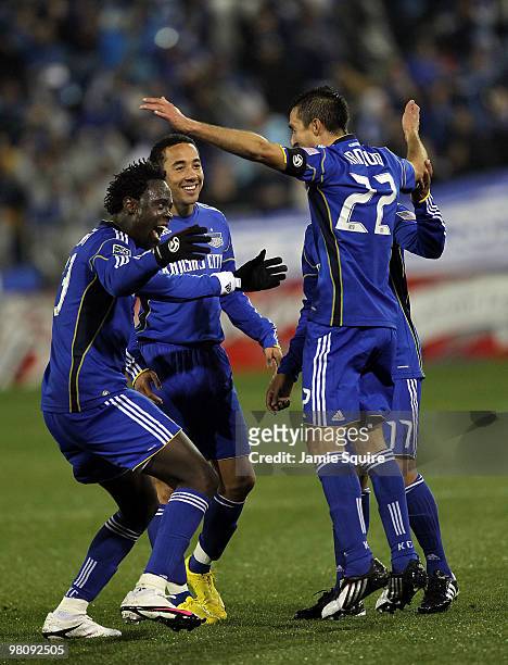 Davy Arnaud of the Kansas City Wizards is congratulated by teammates after scoring during the game against D.C United on March 27, 2010 at Community...