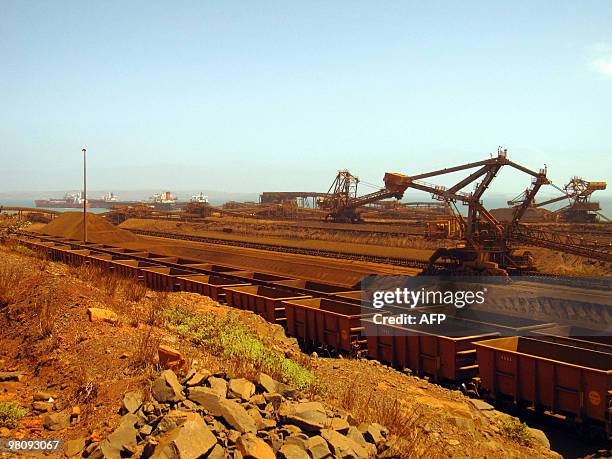 Technology-Australia-Britain-mining-RioTinto, by Amy Coopes This photo taken on March 4, 2010 shows Remote-controlled stackers and reclaimers moving...