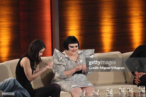 Singers Lena Meyer-Landrut and Beth Ditto hold their thumbs during the 188th 'Wetten dass ...?' show at Messezentrum Salzburg on March 27, 2010 in...