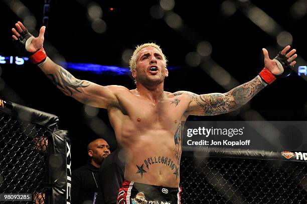 Fighter Kurt Pellegrino celebrates his win over Fabricio Camoes during their Lightweight "Swing" bout at UFC 111 at the Prudential Center on March...