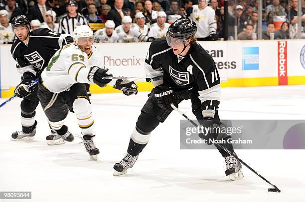 Anze Kopitar of the Los Angeles Kings skates with the puck against Mike Ribeiro of the Dallas Stars on March 27, 2010 at Staples Center in Los...