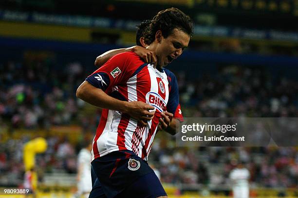 Chiva's player Omar Arellano celebrates his scored goal against San Luis during their match in the Bicentenario 2010 tournament, the closing stage of...