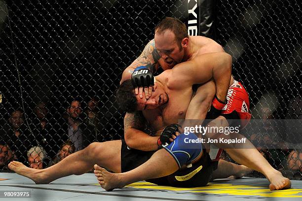 Fighter Shane Carwin battles against Frank Mir during their "Interim" Heavyweight title bout at UFC 111 at the Prudential Center on March 27, 2010 in...