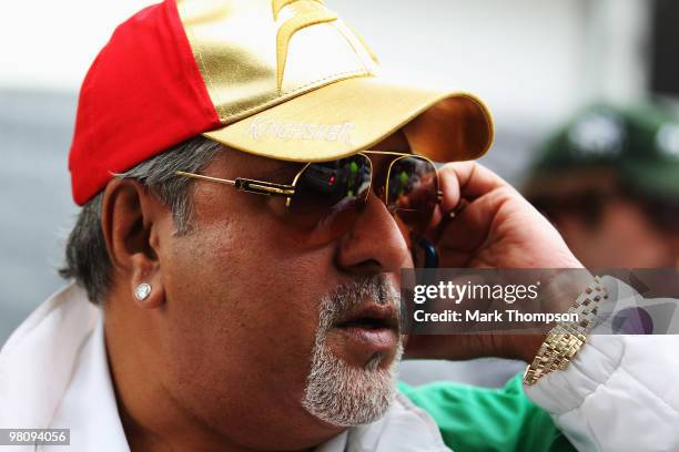 Force India Chairman Vijay Mallya walks in the paddock during the Australian Formula One Grand Prix at the Albert Park Circuit on March 28, 2010 in...