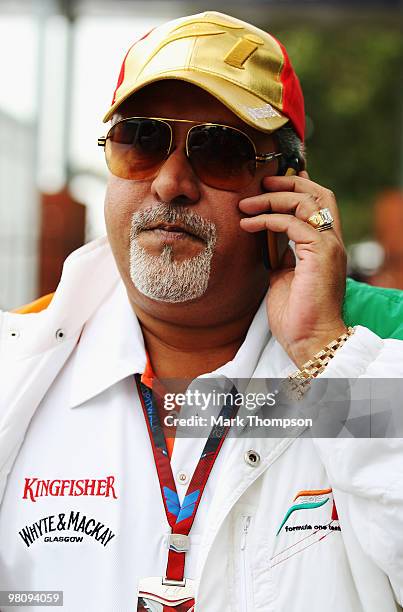 Force India Chairman Vijay Mallya walks in the paddock during the Australian Formula One Grand Prix at the Albert Park Circuit on March 28, 2010 in...