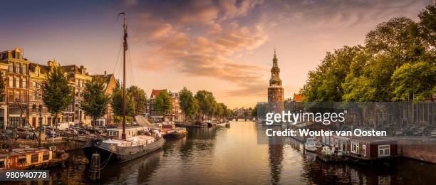 horizontal panorama of city at sunset, amsterdam, netherlands - amsterdam foto e immagini stock