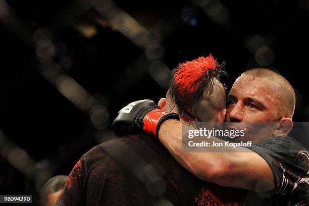 Fighter Georges St-Pierre celebrates his win over Dan Hardy during their Welterweight title bout at UFC 111 at the Prudential Center on March 27,...