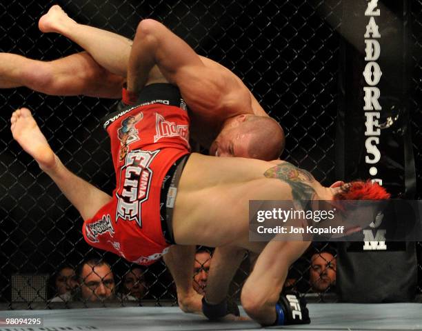 Fighter Georges St-Pierre battles Dan Hardy during their Welterweight title bout at UFC 111 at the Prudential Center on March 27, 2010 in Newark, New...