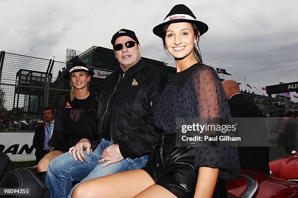 Actor John Travolta is seen on the grid before the Australian Formula One Grand Prix at the Albert Park Circuit on March 28, 2010 in Melbourne,...