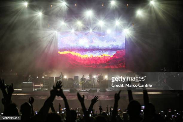 Noel Gallagher, with members of High Flying Birds, performing live during the concert at the Arena Flegrea in Naples.