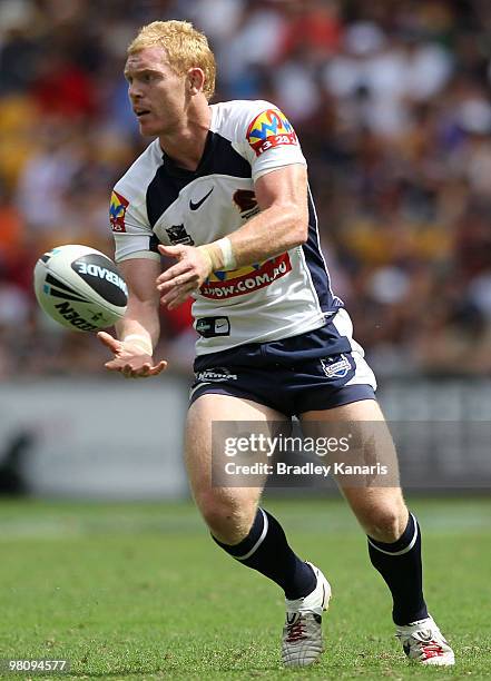 Peter Wallace of the Broncos passes the ball during the round three NRL match between the Brisbane Broncos and the New Zealand Warriors at Suncorp...