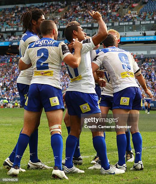 Ben Barba of the Bulldogs celebrates scoring a try during the round three NRL match between the Canterbury Bulldogs and the Sydney Roosters at ANZ...