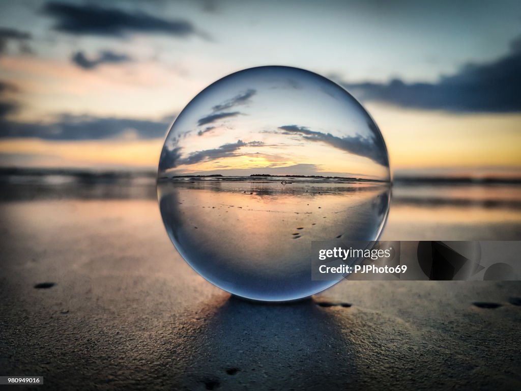 Watching sunrise throught a lens ball - Riviera Romagnola