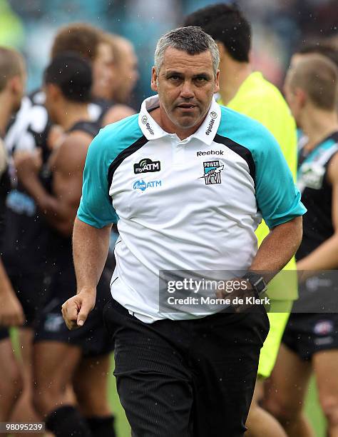 Coach Mark Williams of the Power leaves the field after the three quarter time break during the round one AFL match between the Port Adelaide Power...