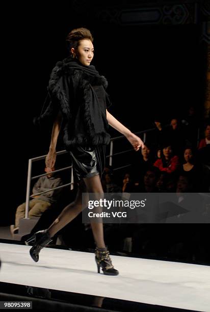 Model showcases collections designed by THROB-IMMOBILE as part of the China Fashion Week A/W on March 27, 2010 in Beijing, China.