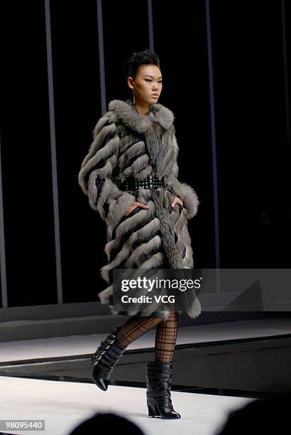 Model showcases collections designed by THROB-IMMOBILE as part of the China Fashion Week A/W on March 27, 2010 in Beijing, China.