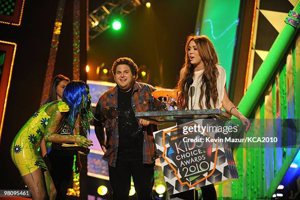 Singer Katy Perry, actor Jonah Hill and musician Miley Cyrus onstage at Nickelodeon's 23rd Annual Kids' Choice Awards held at UCLA's Pauley Pavilion...