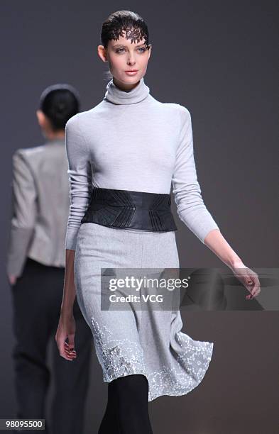 Model showcases collections designed by NUIT BLANCHE as part of the China Fashion Week A/W on March 26, 2010 in Beijing, China.