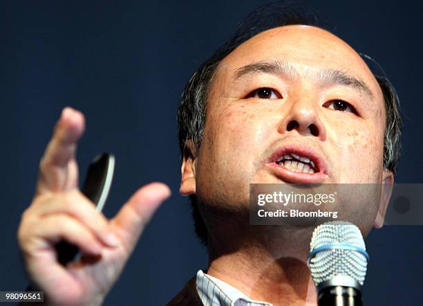 Masayoshi Son, president and chief executive officer of SoftBank Corp., speaks during the unveiling of the company's HTC Desire smartphone in Tokyo,...