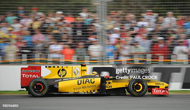 Renault driver Robert Kubica of Poland lights up the brakes during the final stages of Formula One's Australian Grand Prix in Melboune on March 28,...