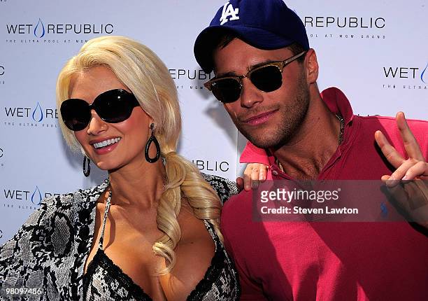 Television personality Holly Madison and singer/dancer Josh Strickland arrive to for a day at Wet Republic on March 27, 2010 in Las Vegas, Nevada.