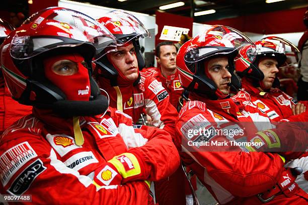 Ferrari mechanics are seen during the Australian Formula One Grand Prix at the Albert Park Circuit on March 28, 2010 in Melbourne, Australia.